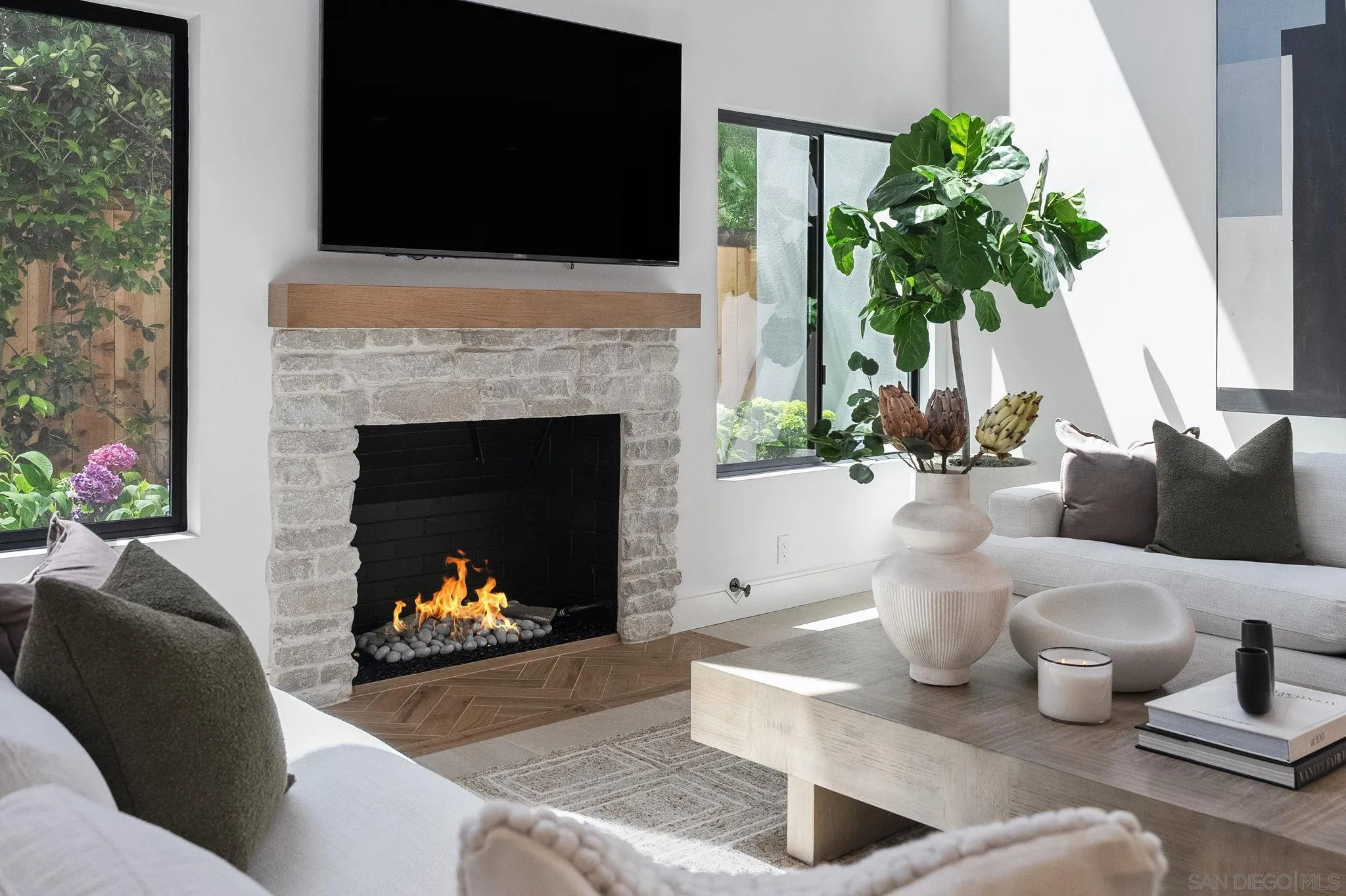 3835 Via Reposo Rancho Santa Fe, CA 92091 - Photo 6 of 34 a living room with furniture and a fireplace