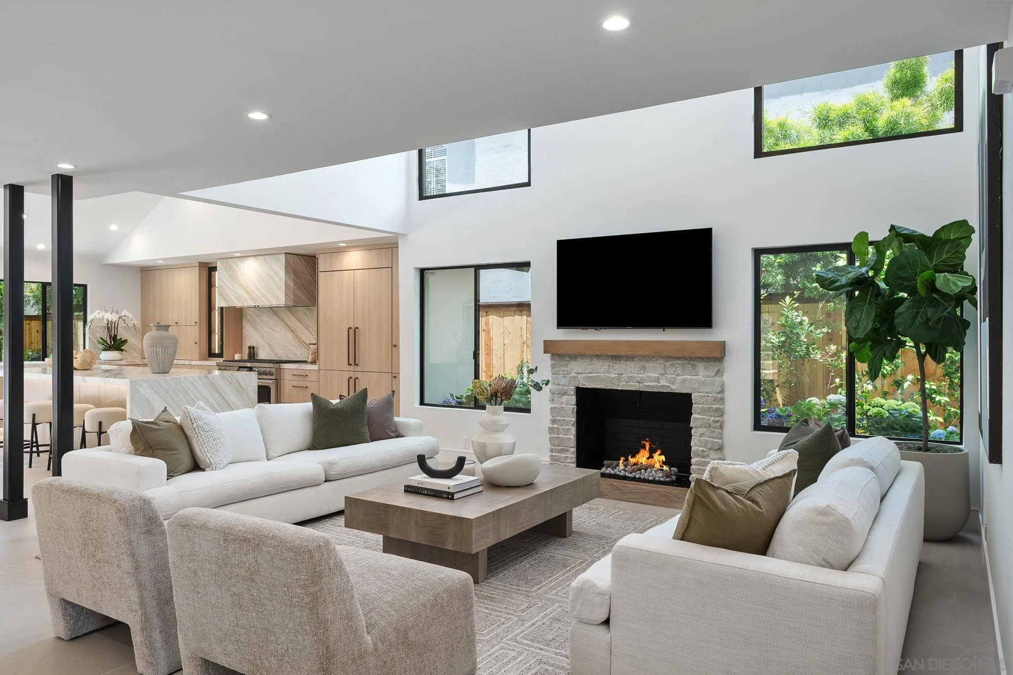 3835 Via Reposo Rancho Santa Fe, CA 92091 - Photo 7 of 34 a living room with furniture fireplace and a flat screen tv