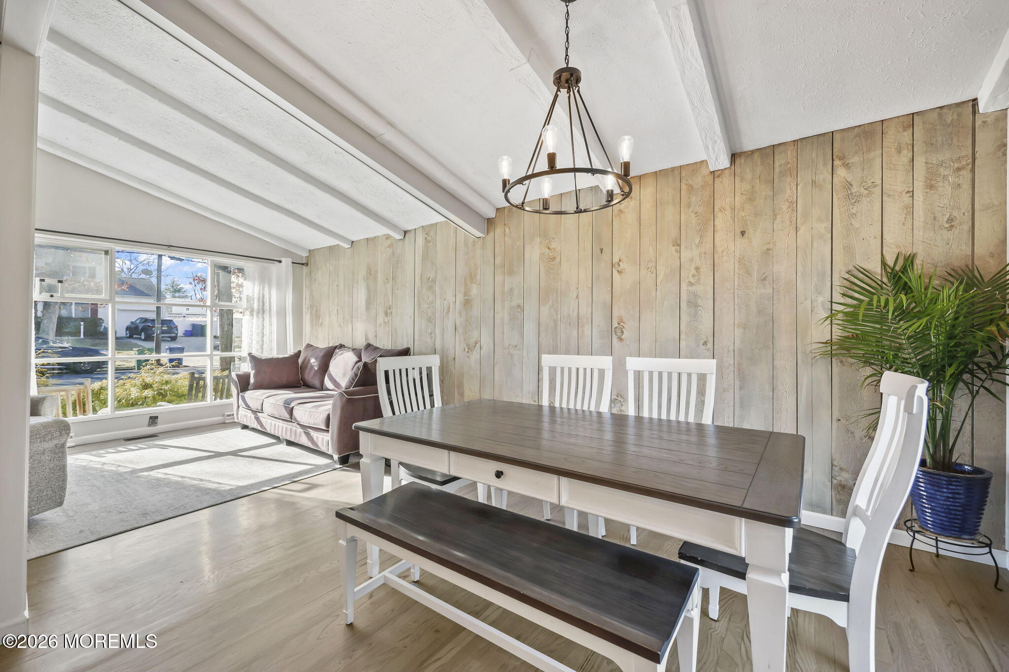 117 Durand Road Neptune Township, NJ 07753 - Photo 14 of 35 a dining room with furniture and a chandelier