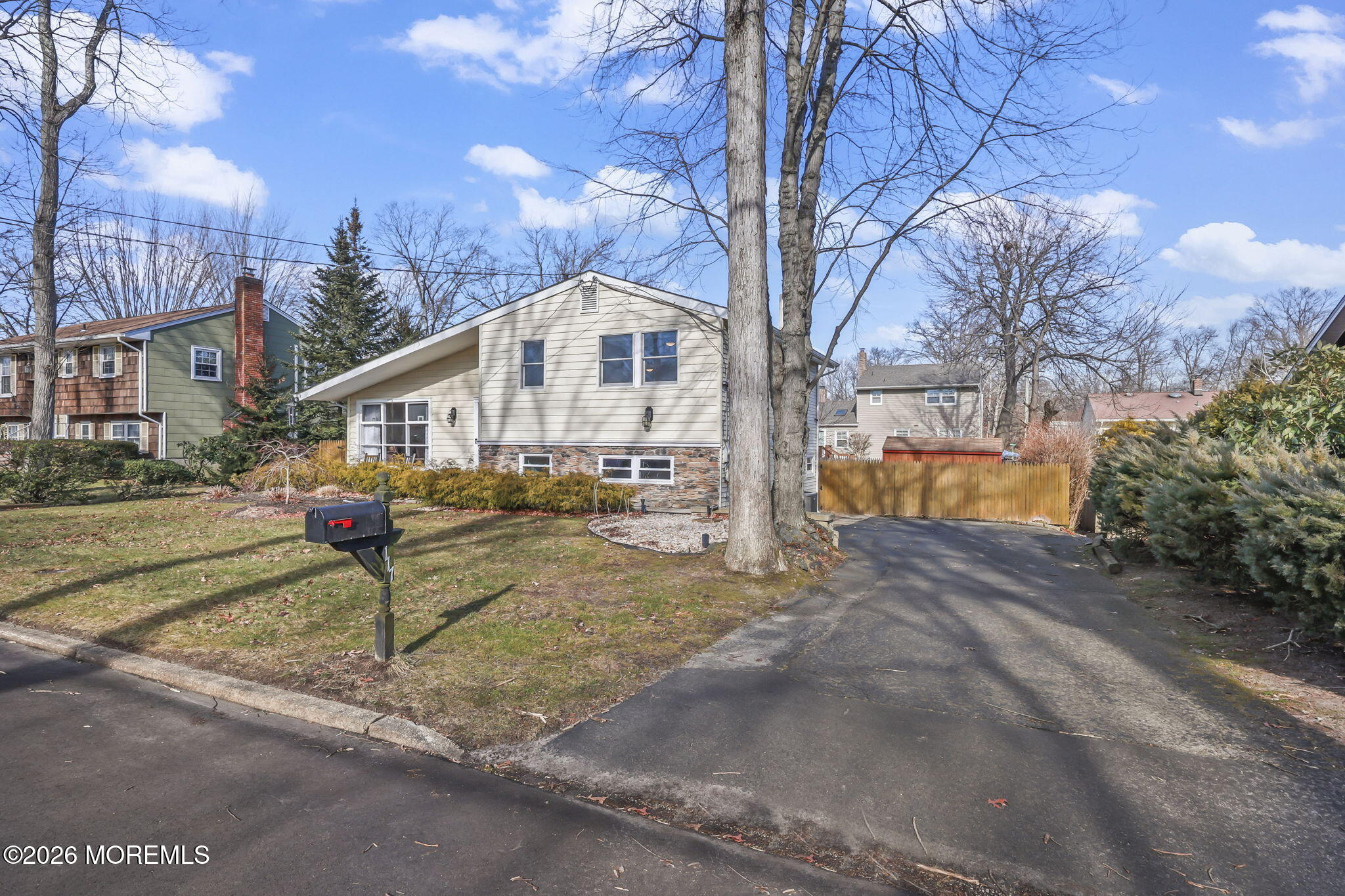 117 Durand Road Neptune Township, NJ 07753 - Photo 2 of 35 a front view of a house with a yard and large tree