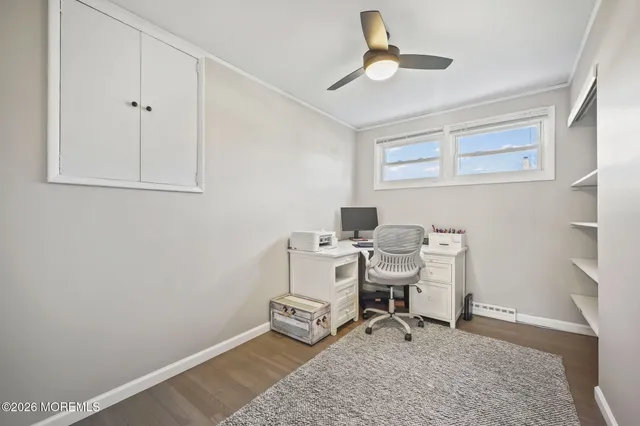 a work room with table and chairs
