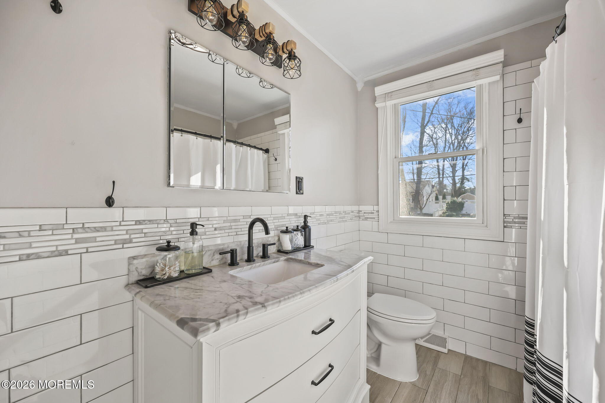 117 Durand Road Neptune Township, NJ 07753 - Photo 35 of 35 a bathroom with a toilet sink and mirror