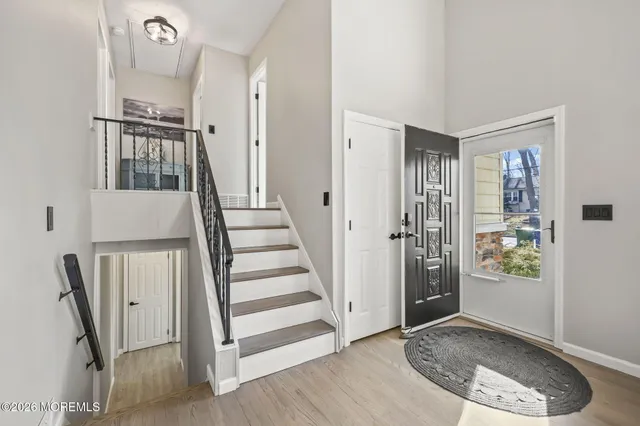 a view of an entryway with staircase