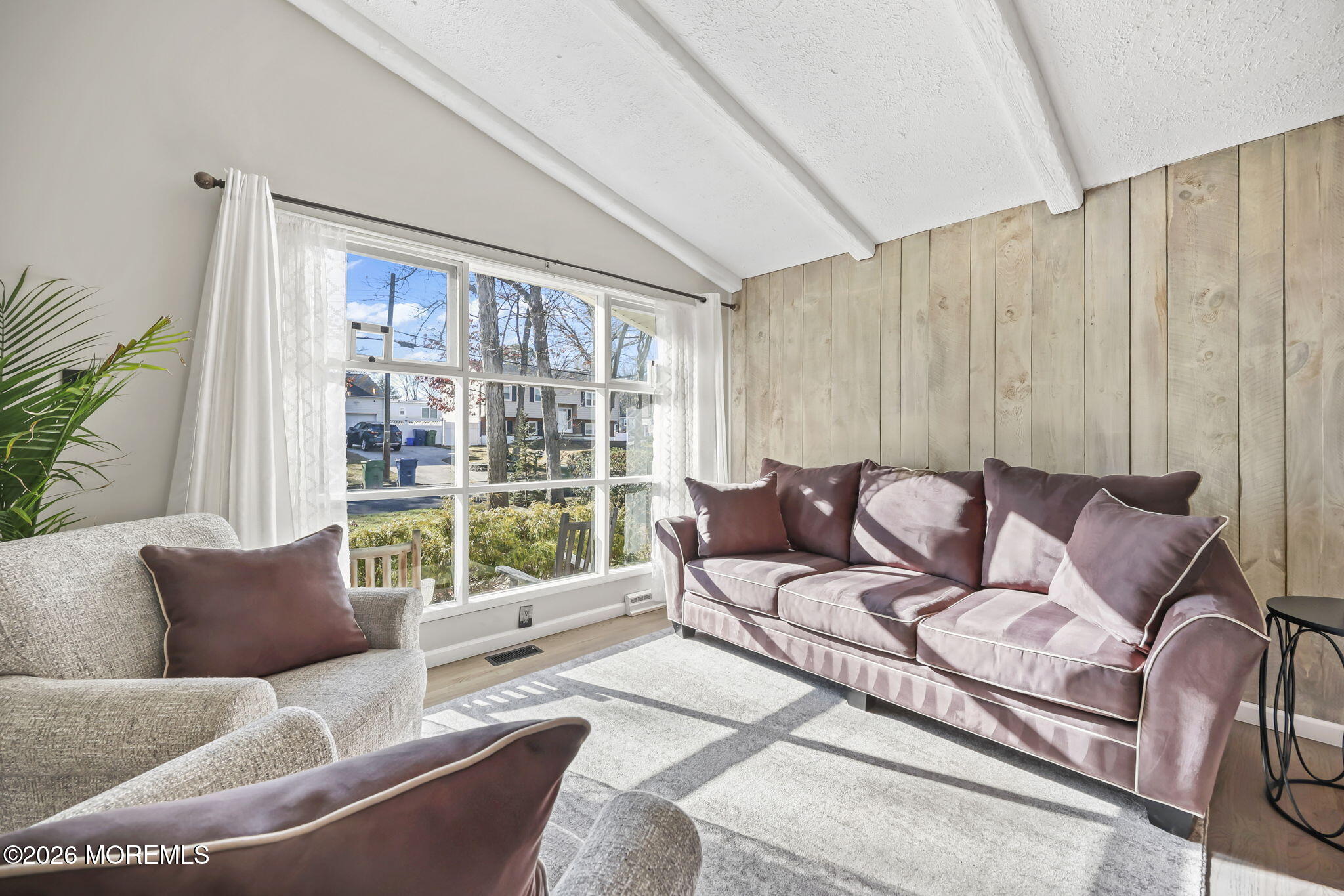117 Durand Road Neptune Township, NJ 07753 - Photo 6 of 35 a living room with furniture and a large window