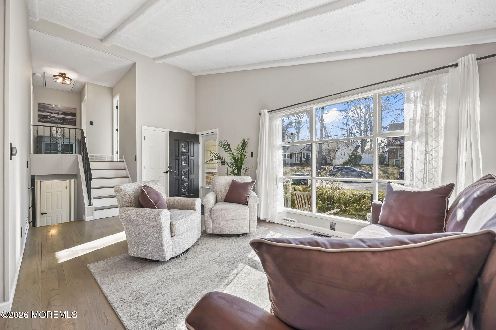 117 Durand Road Neptune Township, NJ 07753 - Photo 7 of 35 a living room with furniture and a large window