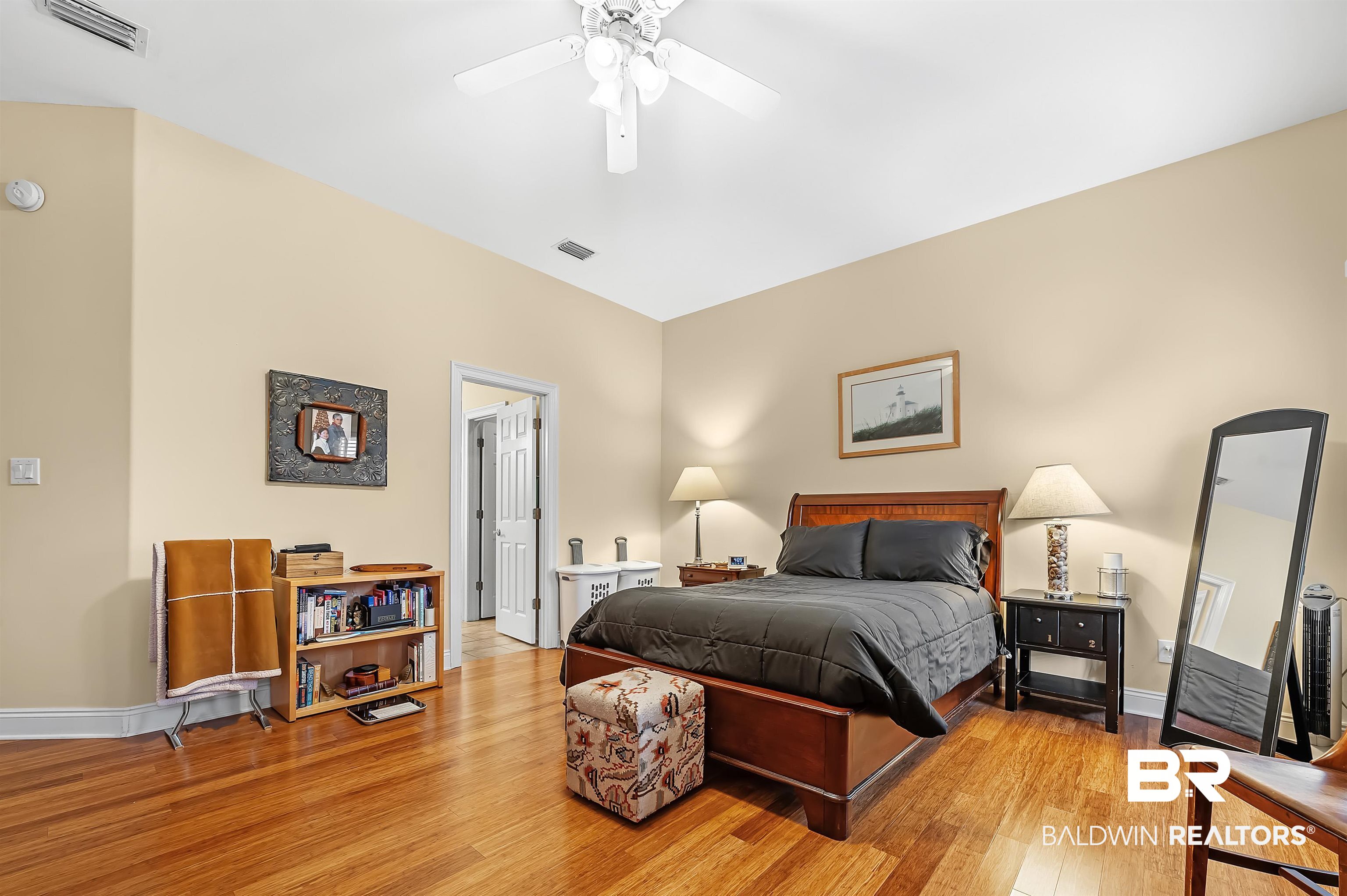 22726 Inverness Way Foley, AL 36535 - Photo 34 of 51 Bedroom featuring ceiling fan and light hardwood / wood-style flooring