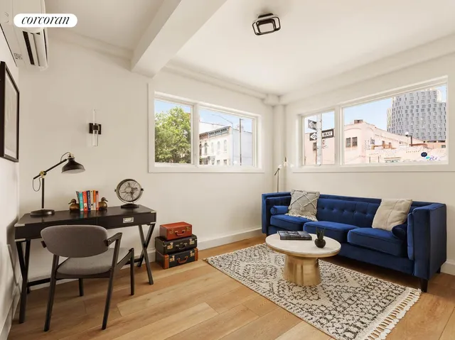 a kitchen with stainless steel appliances a sink and cabinets