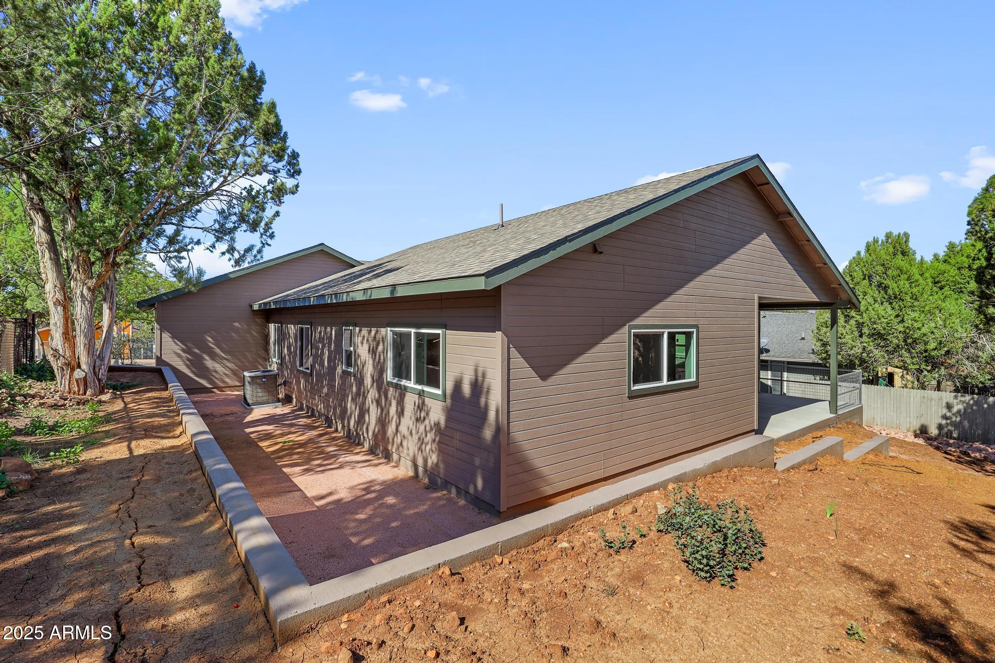 1019 South Ponderosa Street Payson, AZ 85541 - Photo 27 of 34 a view of a house with wooden fence