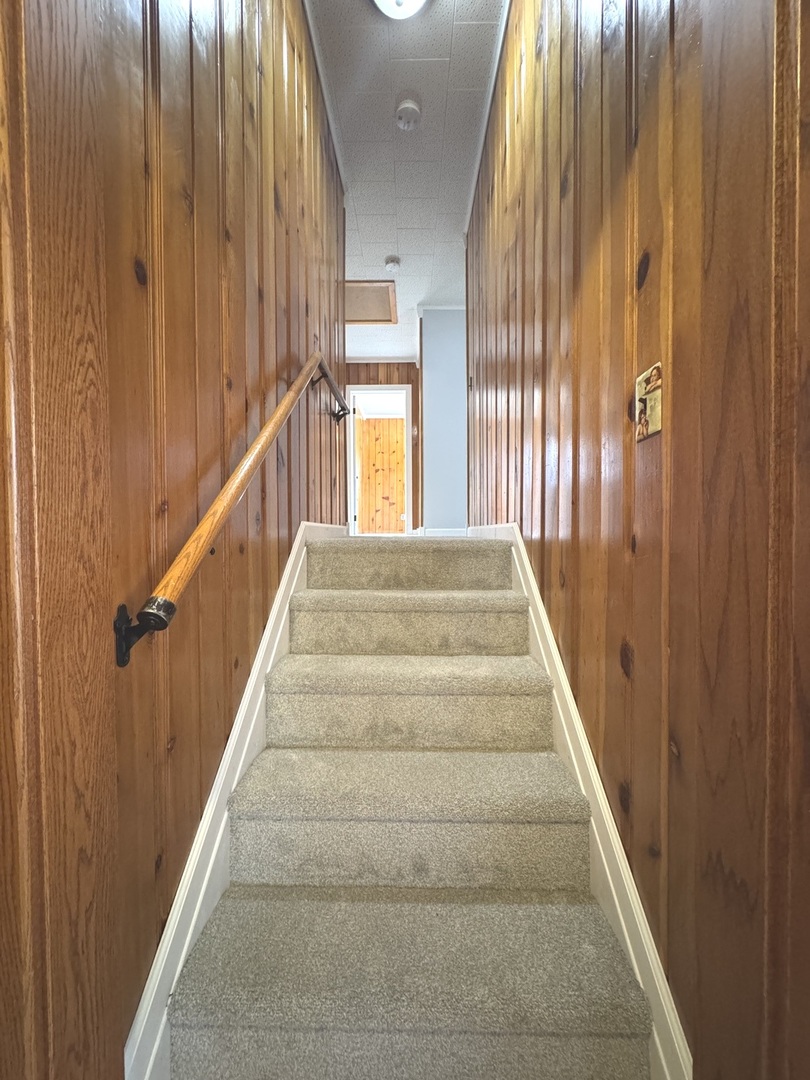 3288 South Hieland Road St. Anne, IL 60964 - Photo 17 of 45 a view of staircase with large window
