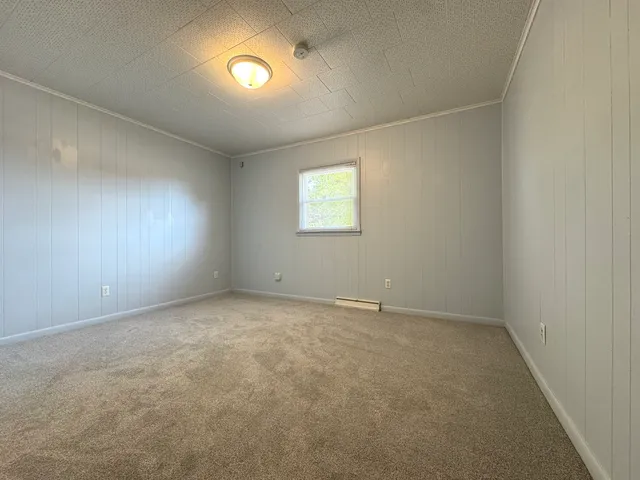 an empty room with a natural light