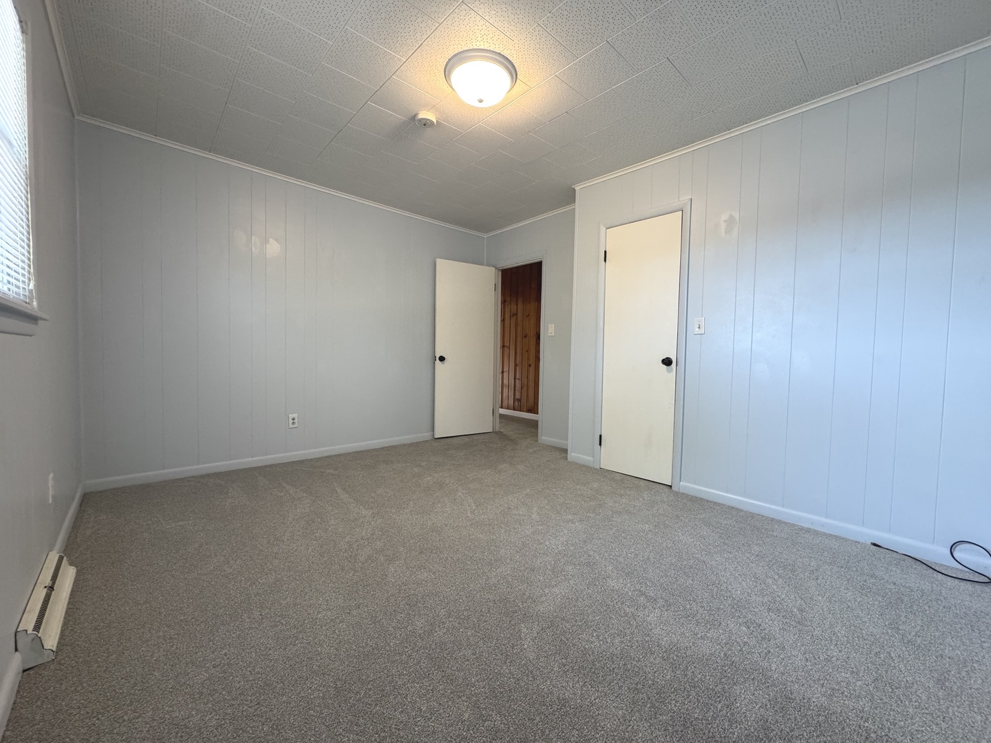 3288 South Hieland Road St. Anne, IL 60964 - Photo 21 of 45 an empty room with a natural light