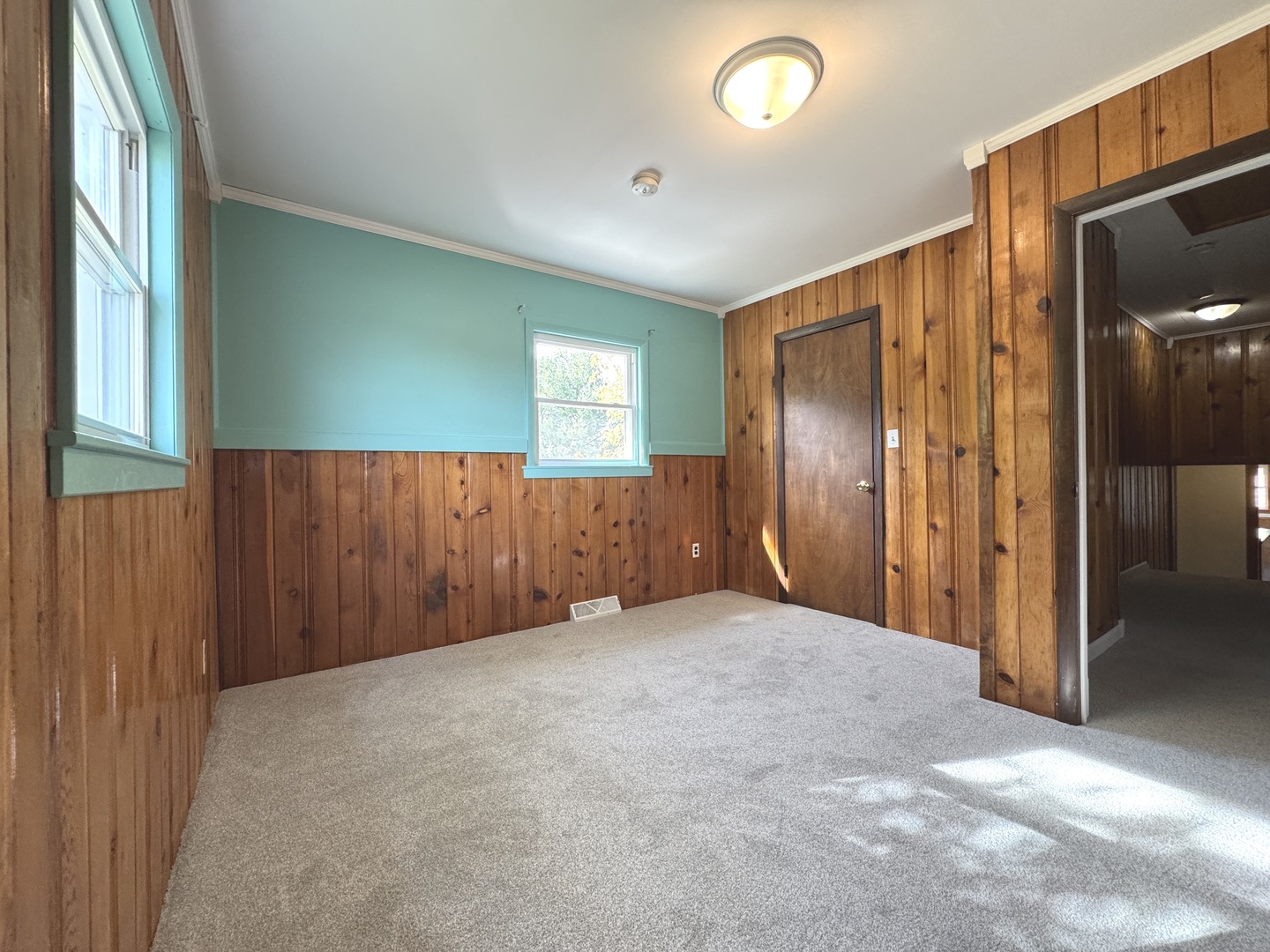 3288 South Hieland Road St. Anne, IL 60964 - Photo 23 of 45 an empty room with closet and wooden floor