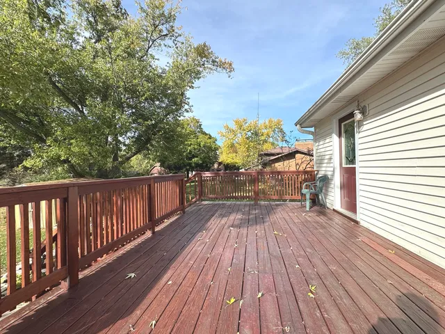 a view of swimming pool with sitting area