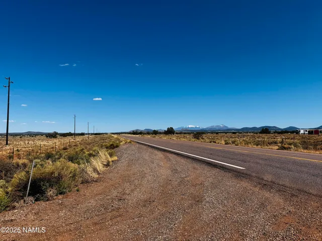 a view of street with ocean view