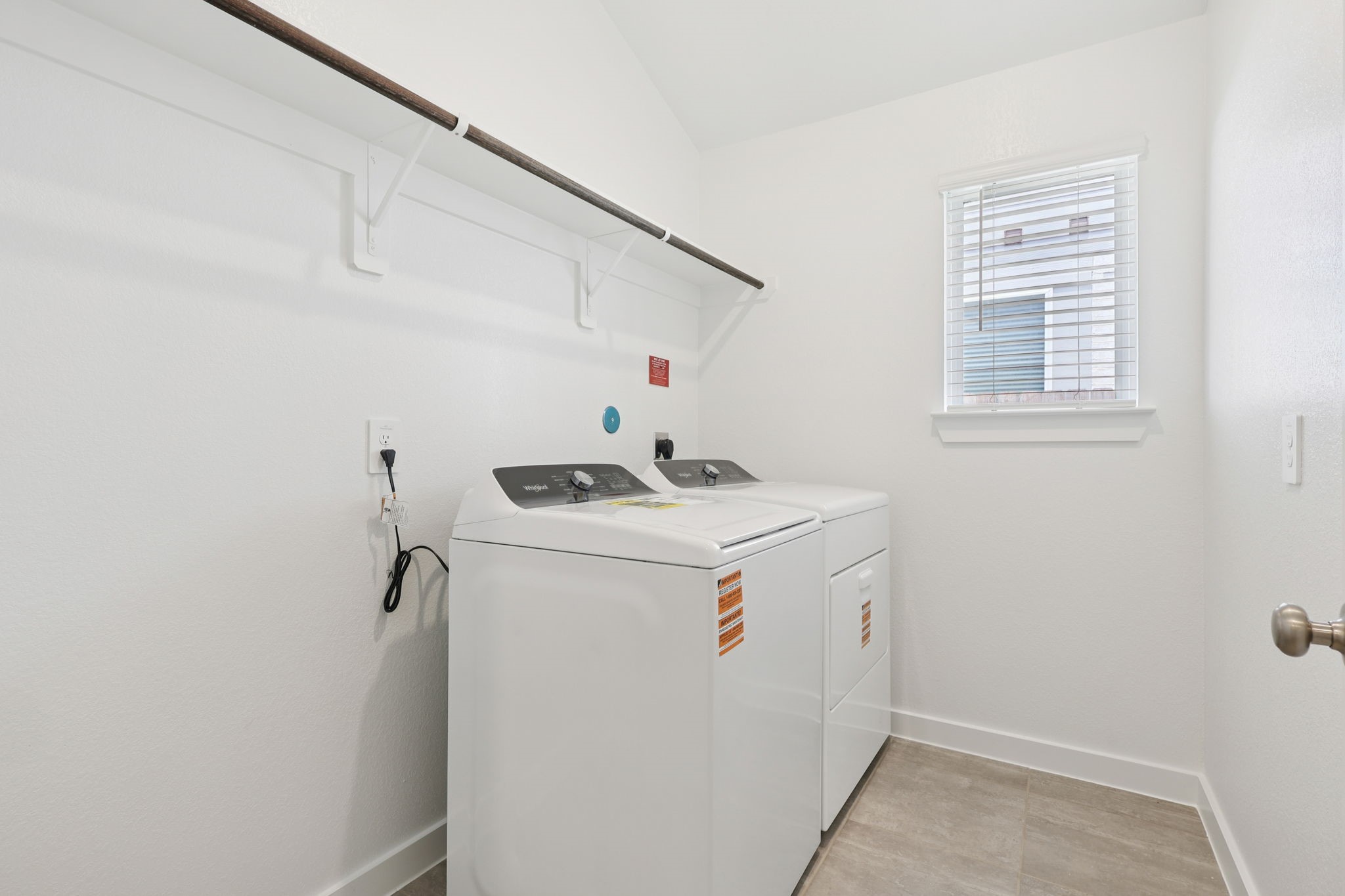 2639 Clapbread Lane Rosenberg, TX 77471 - Photo 22 of 31 a utility room with dryer and washer