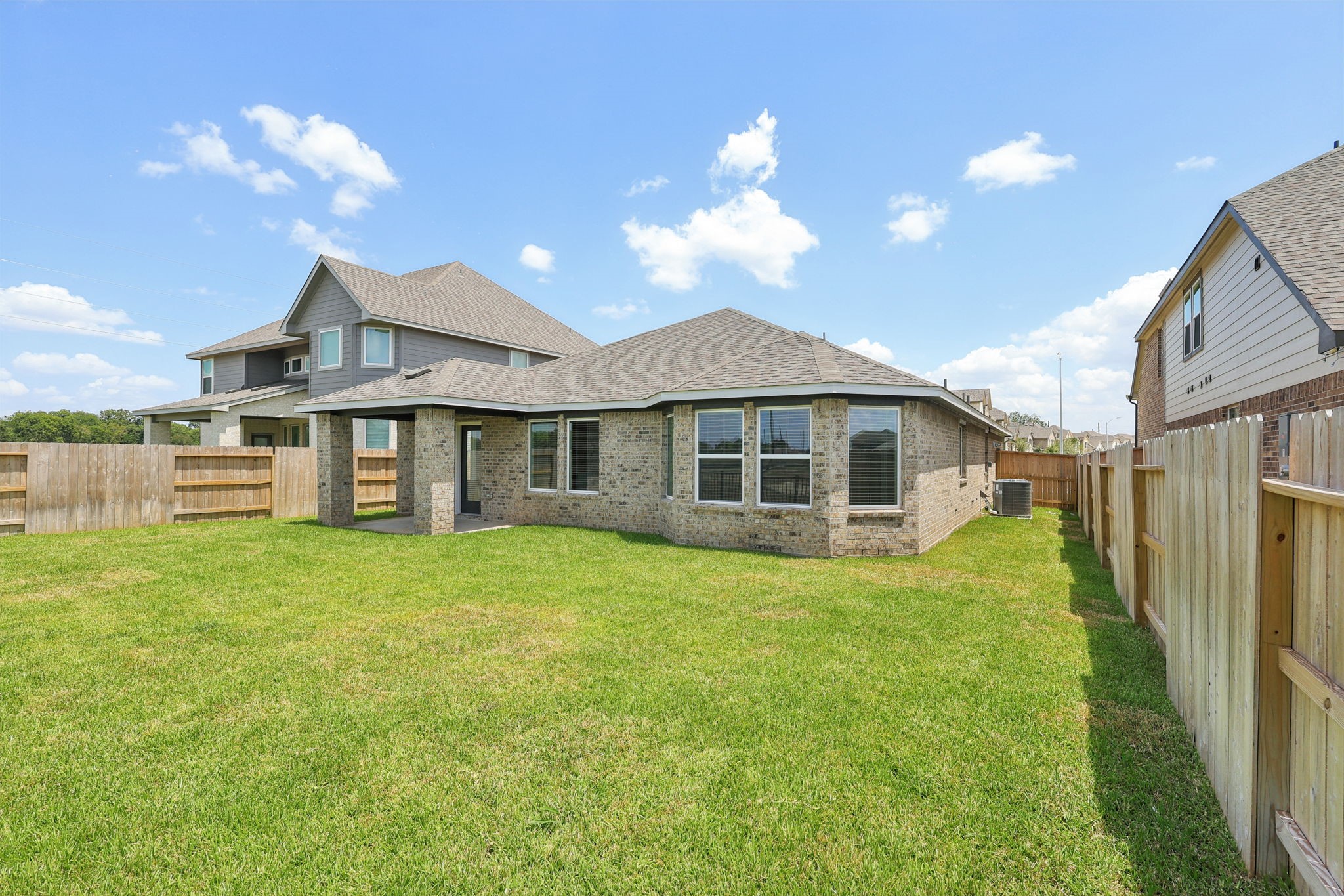 2639 Clapbread Lane Rosenberg, TX 77471 - Photo 31 of 31 a front view of a house with a yard