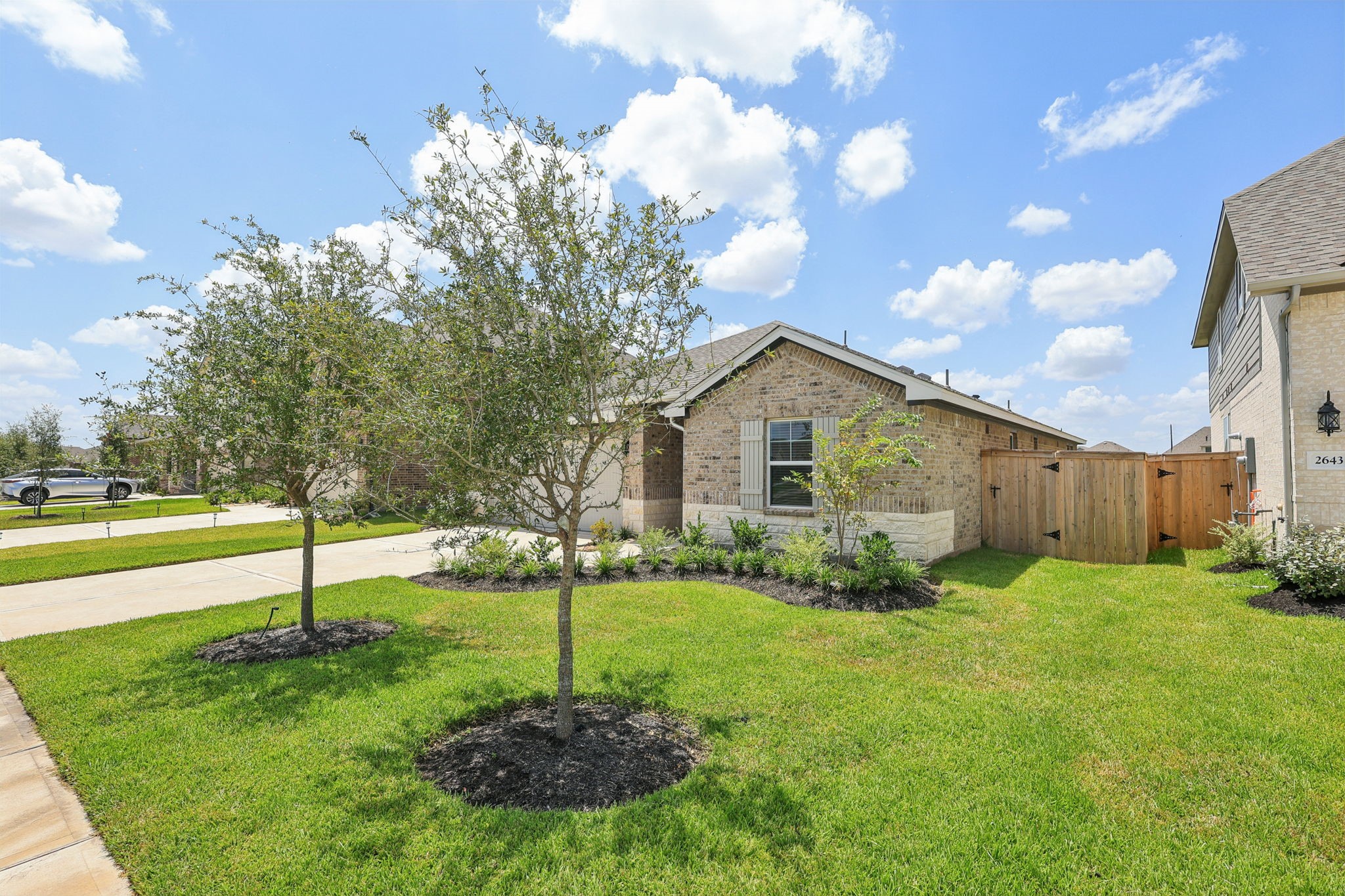 2639 Clapbread Lane Rosenberg, TX 77471 - Photo 4 of 31 a view of a house with backyard and garden