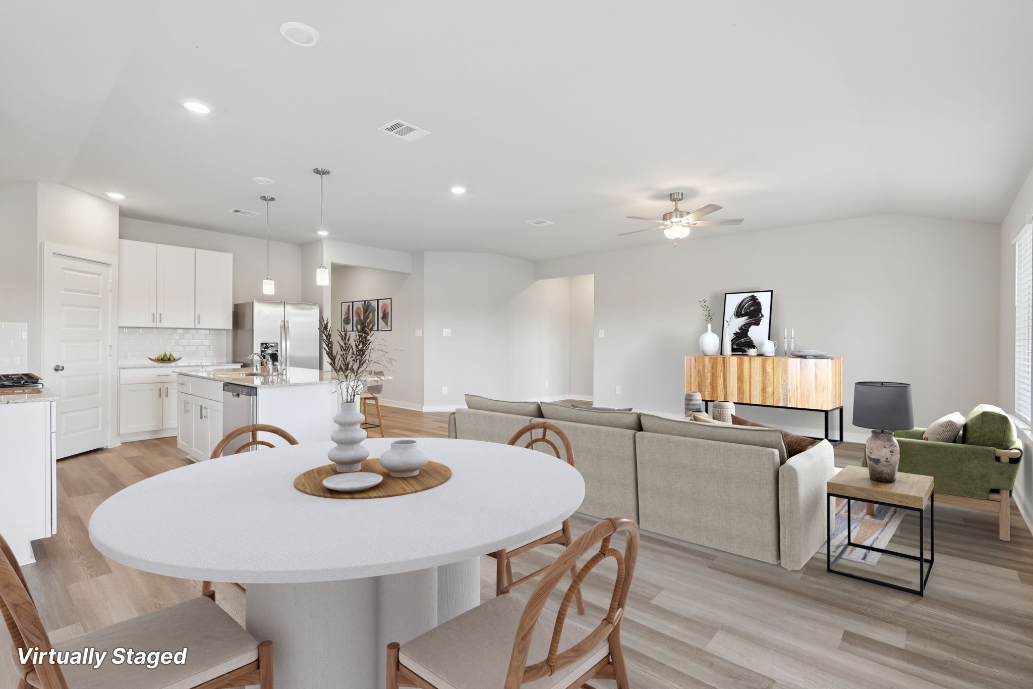 2639 Clapbread Lane Rosenberg, TX 77471 - Photo 6 of 31 a view of a dining room with furniture and wooden floor