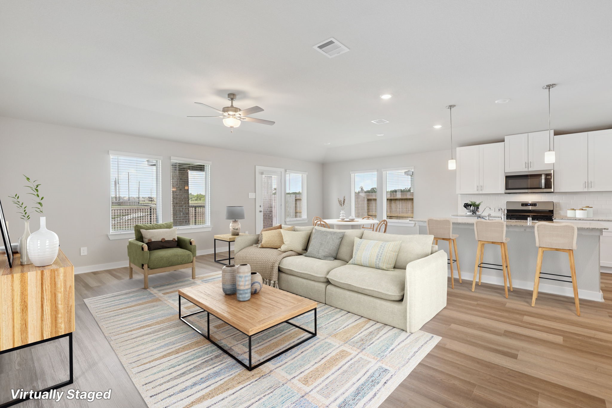 2639 Clapbread Lane Rosenberg, TX 77471 - Photo 10 of 31 a living room with furniture and a wooden floor