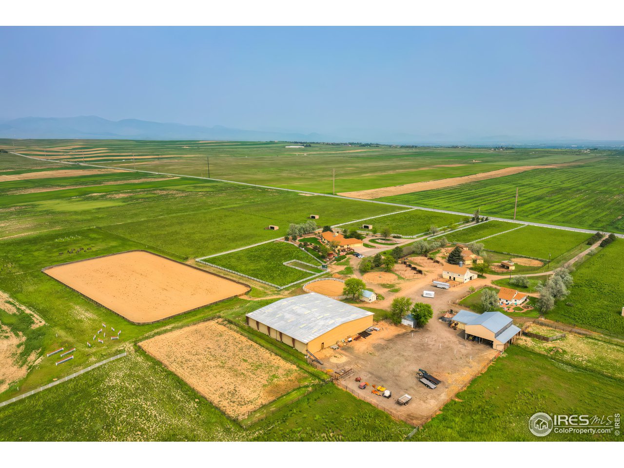 Aerial view looking to the north-west. Property is surrounded by County open space on three sides to the east, the west, and to the north.