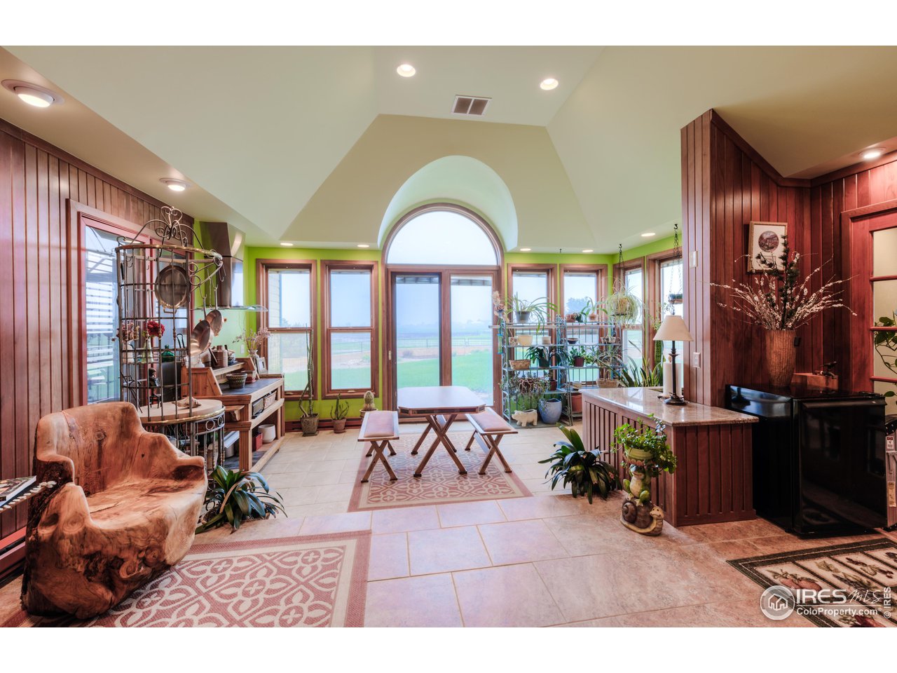10024 Lookout Road Lafayette, CO 80026 - Photo 13 of 37 Sun Room has small kitchen capability for Sunday Brunches.