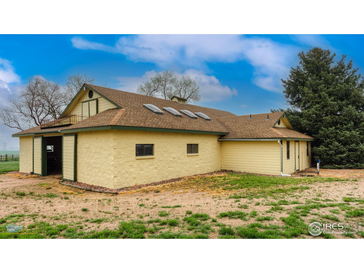 10024 Lookout Road Lafayette, CO 80026 - Photo 20 of 37 North cinderblock barn has hay storage access above.