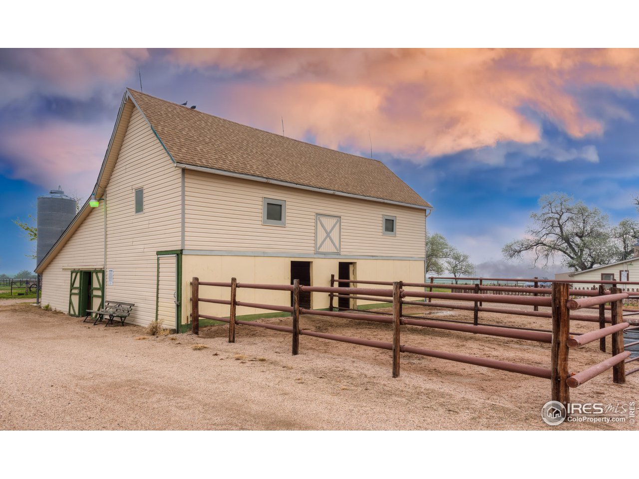 10024 Lookout Road Lafayette, CO 80026 - Photo 25 of 37 South Barn has 7 stalls, tack room, and hay loft.