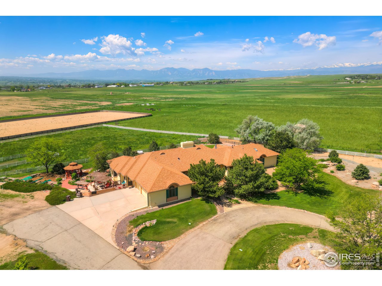 10024 Lookout Road Lafayette, CO 80026 - Photo 3 of 37 Ranch-style main Residence looking west across county open space (undevelopable) toward great mountain views and the Continental Divide.
