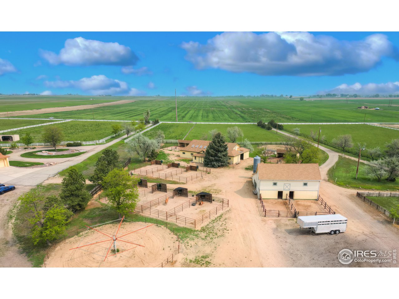 10024 Lookout Road Lafayette, CO 80026 - Photo 33 of 37 View looking north over the barns and turnout paddocks.