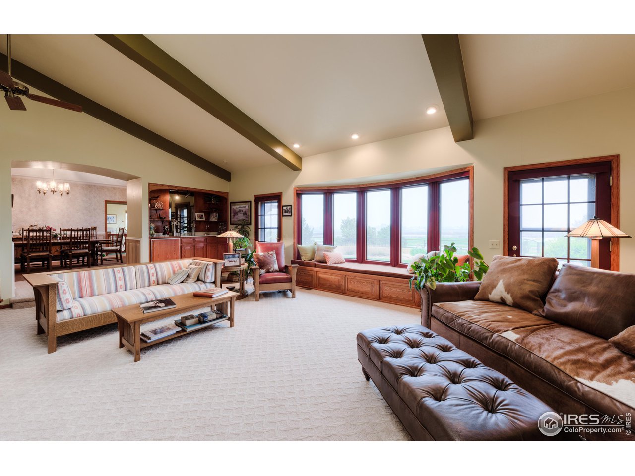 10024 Lookout Road Lafayette, CO 80026 - Photo 8 of 37 Living room opens to Formal Dining area