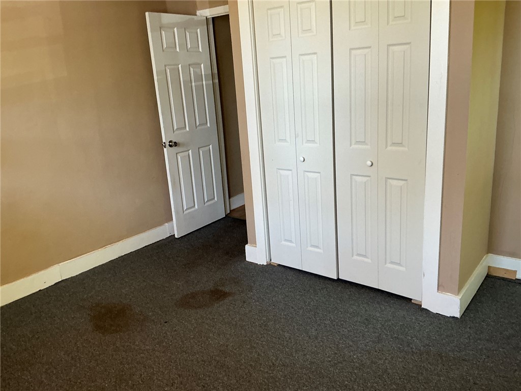 11 Humbert Street Seneca, SC 29678 - Photo 12 of 14 This spacious bedroom offers ample storage with convenient bi-fold closet doors.