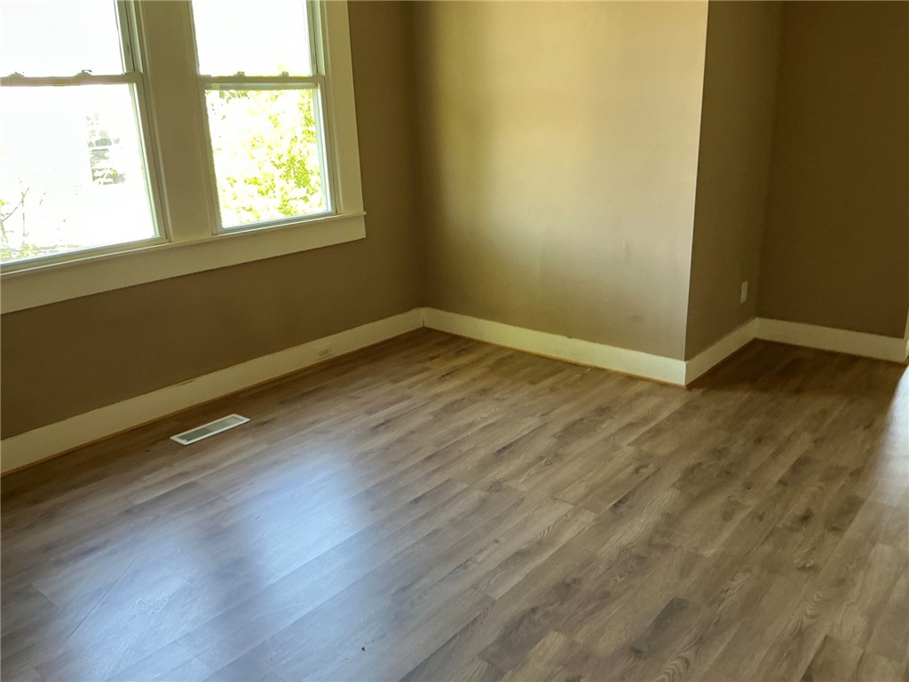 11 Humbert Street Seneca, SC 29678 - Photo 3 of 14 This spacious room offers versatile living with ample natural light.