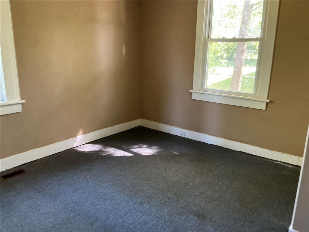 11 Humbert Street Seneca, SC 29678 - Photo 8 of 14 This bright room offers ample natural light, creating a refreshing and inviting atmosphere.