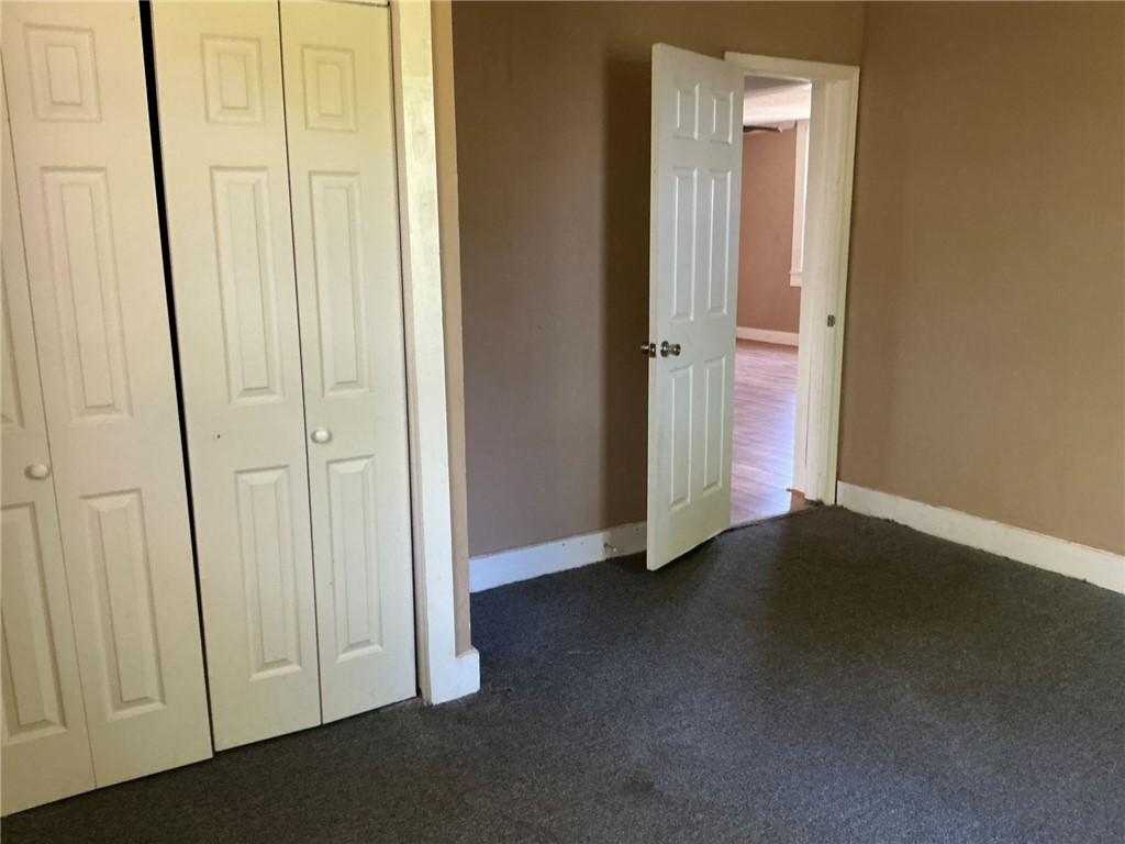 11 Humbert Street Seneca, SC 29678 - Photo 10 of 14 This cozy bedroom provides a comfortable retreat with ample storage.