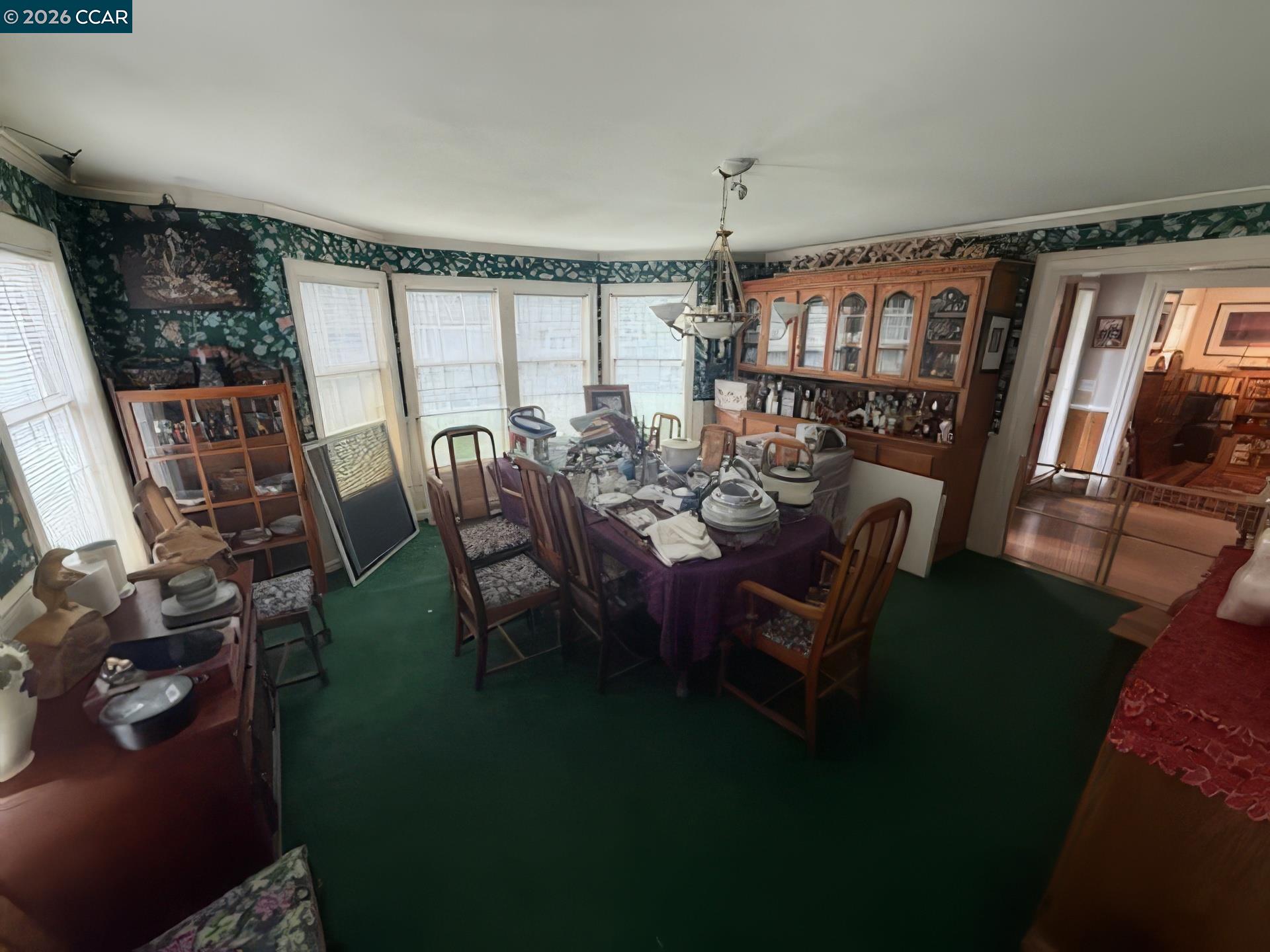 10580 Dickson Road Plymouth, CA 95669 - Photo 16 of 64 a living room with furniture and a floor to ceiling window