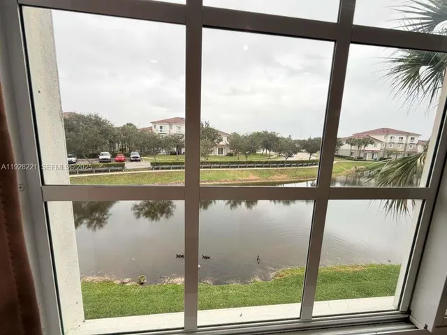 a view of a lake from a window