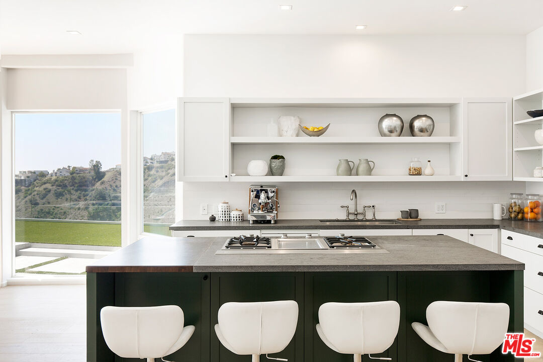 7868 Electra Drive Los Angeles, CA 90046 - Photo 21 of 38 a view of table and chair