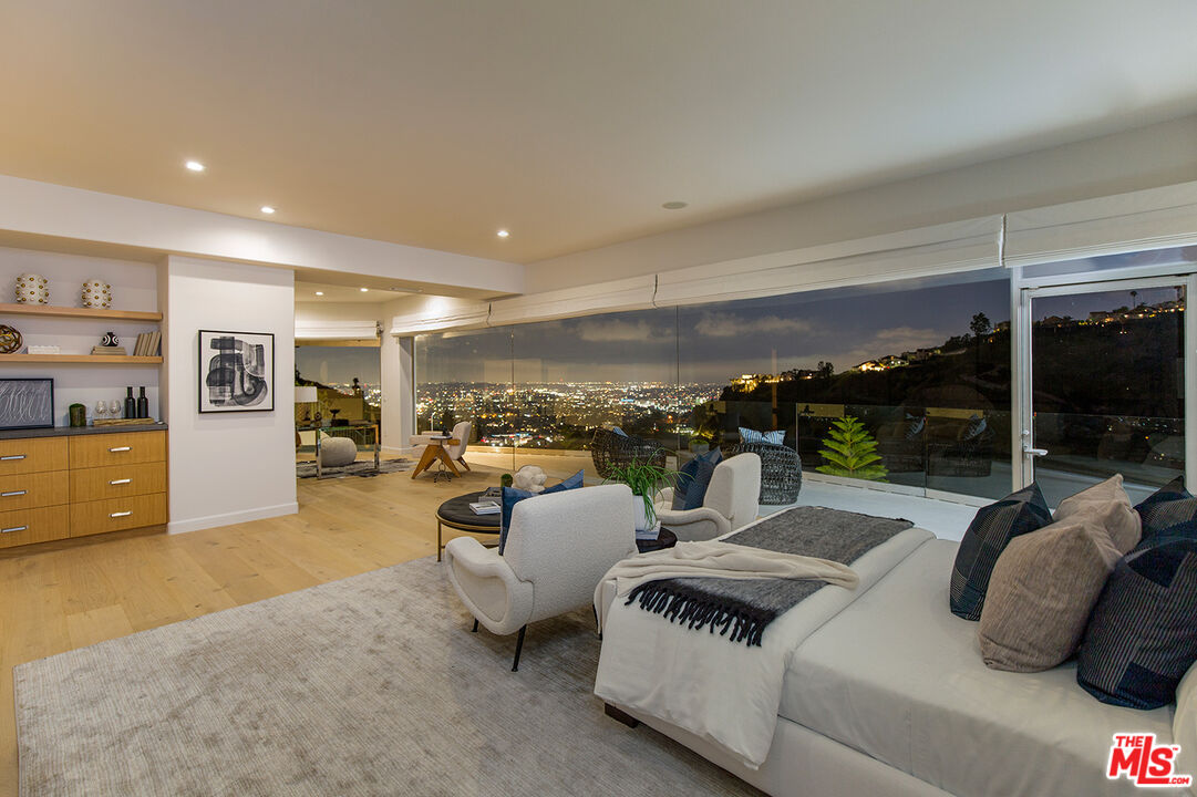 7868 Electra Drive Los Angeles, CA 90046 - Photo 28 of 38 a living room with furniture and a large window