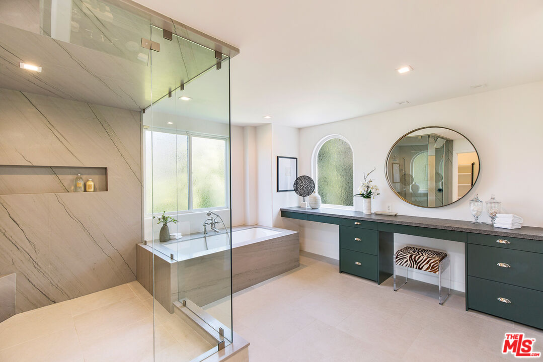 7868 Electra Drive Los Angeles, CA 90046 - Photo 33 of 38 a living room with furniture and a mirror