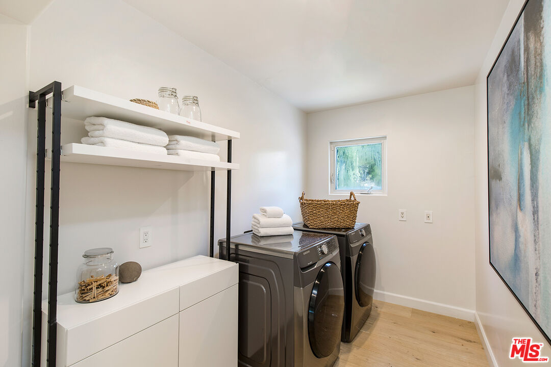 7868 Electra Drive Los Angeles, CA 90046 - Photo 36 of 38 a view of storage and utility room with washer and dryer