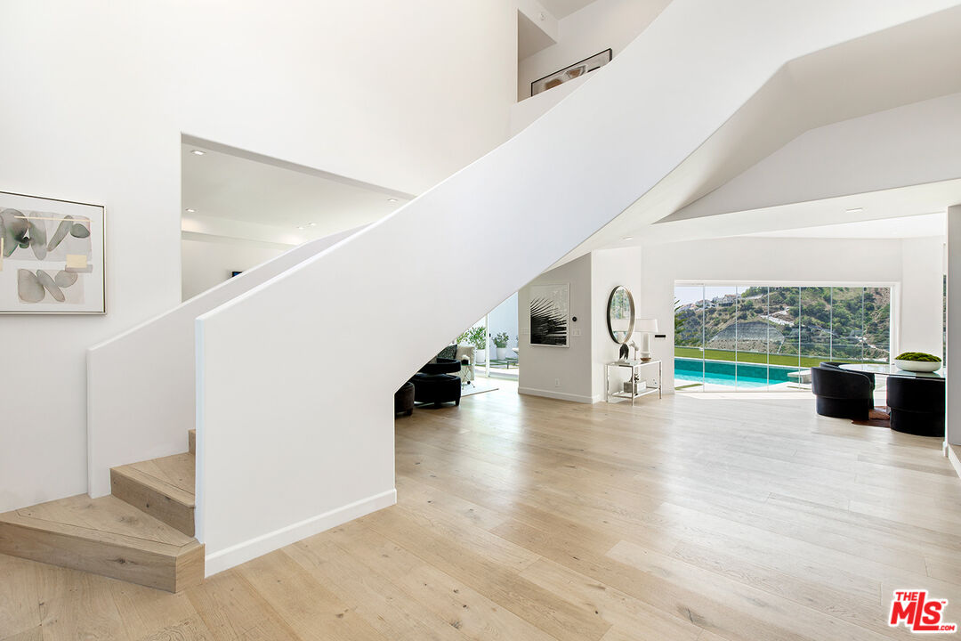 7868 Electra Drive Los Angeles, CA 90046 - Photo 6 of 38 a view of an entryway and livingroom in right side