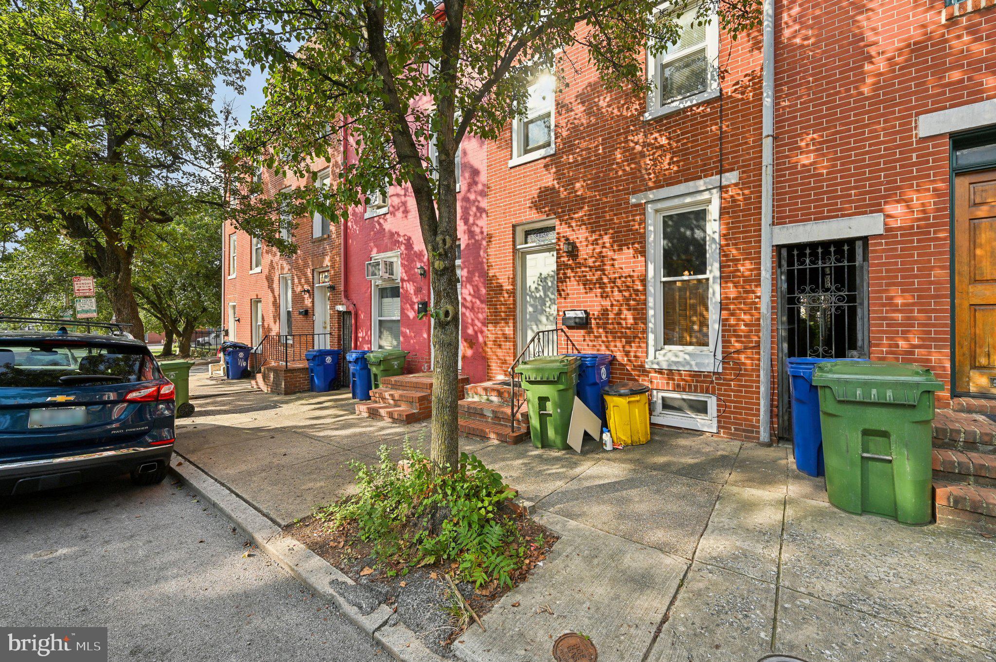 110 South Poppleton Street Baltimore, MD 21201 - Photo 1 of 39 a view of a parking space with cars parked