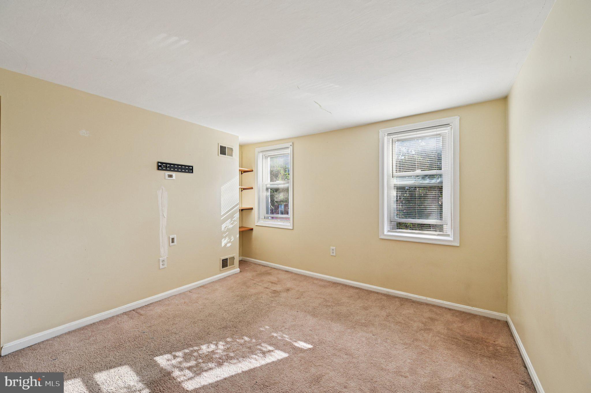 110 South Poppleton Street Baltimore, MD 21201 - Photo 17 of 39 a view of an empty room with a window