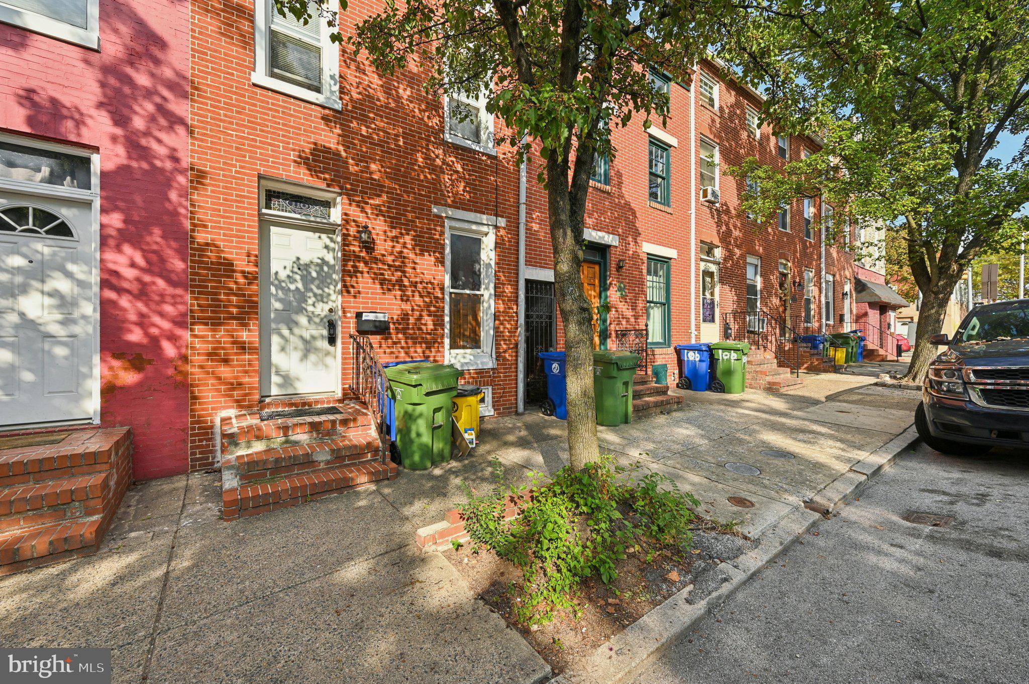 110 South Poppleton Street Baltimore, MD 21201 - Photo 2 of 39 a view of a street with a building