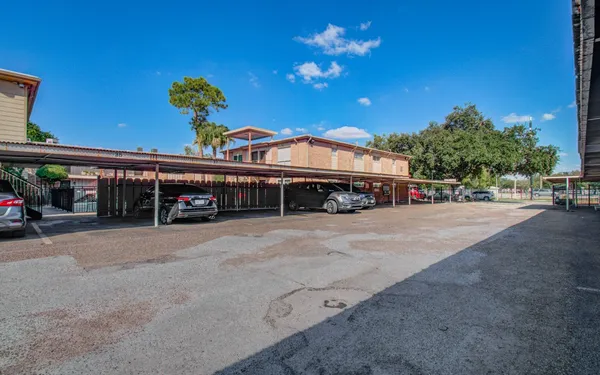 a view of a street with cars