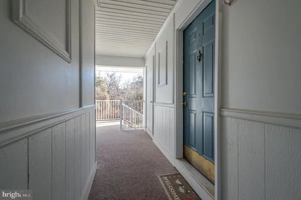a view of a glass door and the balcony