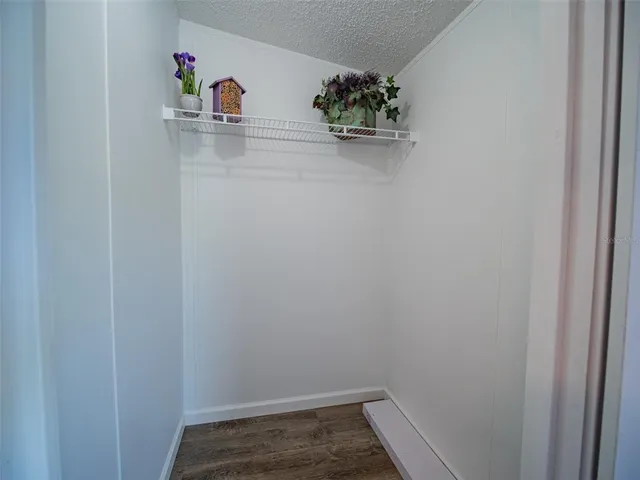 a bathroom with a sink a vanity and a mirror
