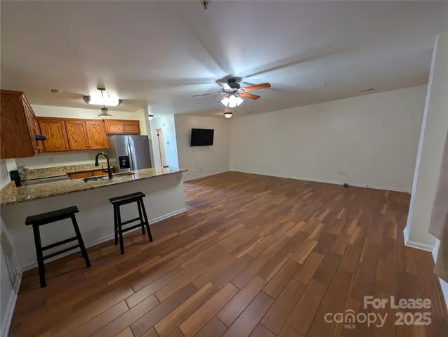 a view of workspace with wooden floor