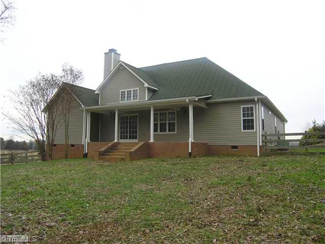 1235 Farmington Road Mocksville, NC 27028 - Photo 4 of 16 Exterior Back. Rear of home showing covered rear porch