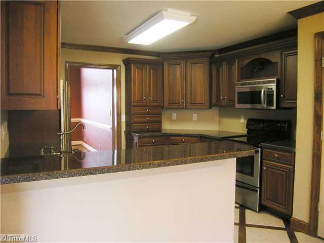 1235 Farmington Road Mocksville, NC 27028 - Photo 7 of 16 Kitchen. Kitchen also has nice sized breakfast area on the opposite side of the kitchen.